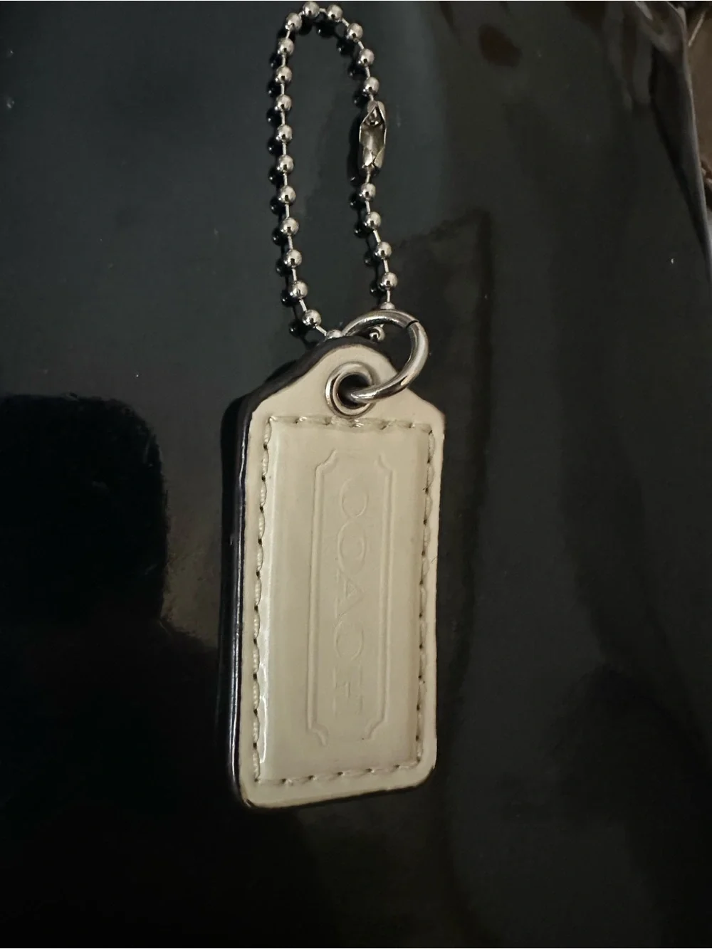 COACH Leather Hangtag | Bag Charm in Cream with Embossed Logo